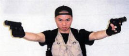 Cho, shown in a self-aggrandizing photo he took of himself prior to killing 32 innocent people and wounding many more. He then killed himself.